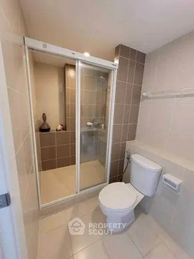 Modern bathroom with glass shower and sleek design