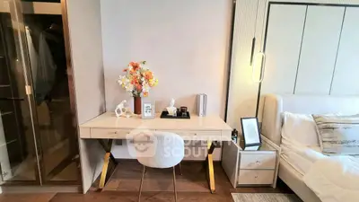 Elegant bedroom with modern desk and cozy decor