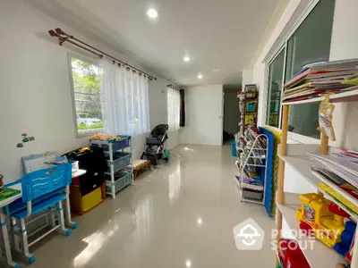 Spacious and bright playroom with large windows and organized shelves