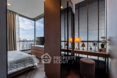 Luxurious bedroom with stunning city view and elegant decor