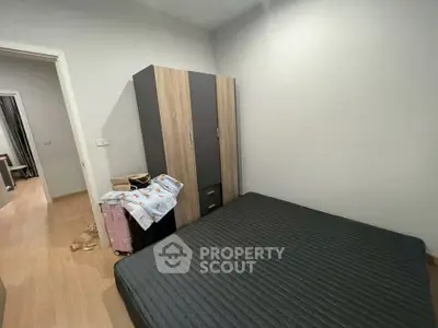 Cozy bedroom with modern wardrobe and minimalist decor