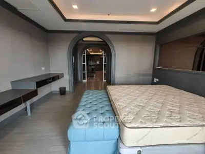 Spacious bedroom with modern design and elegant furnishings