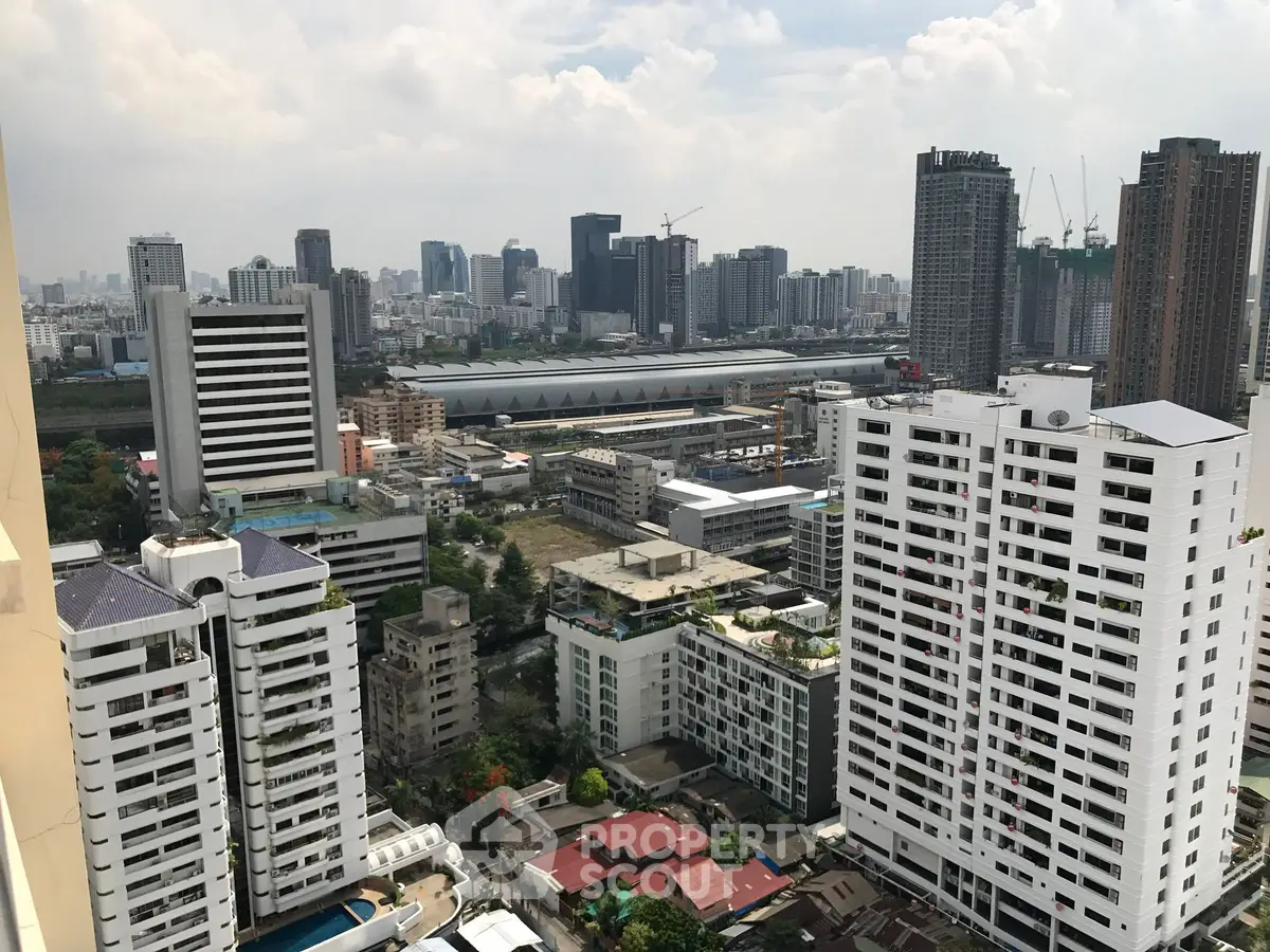 Stunning cityscape view from high-rise building balcony in urban skyline