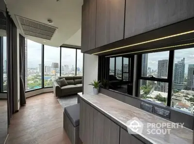 Luxurious corner unit with panoramic city views and modern interior design