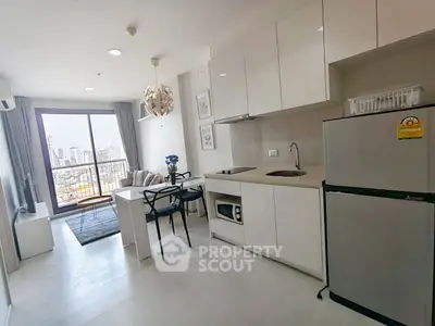 Modern open-layout kitchen with city view in a stylish apartment