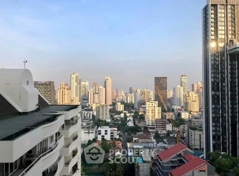 Stunning cityscape view from high-rise building showcasing urban skyline and modern architecture.