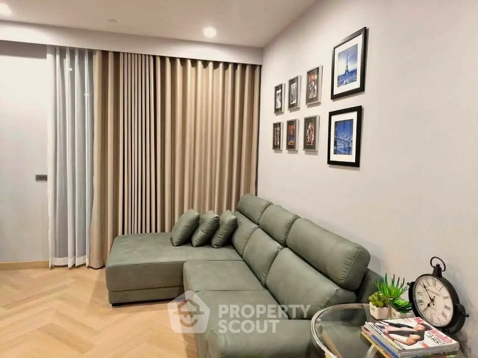 Modern living room with stylish green sofa and elegant decor