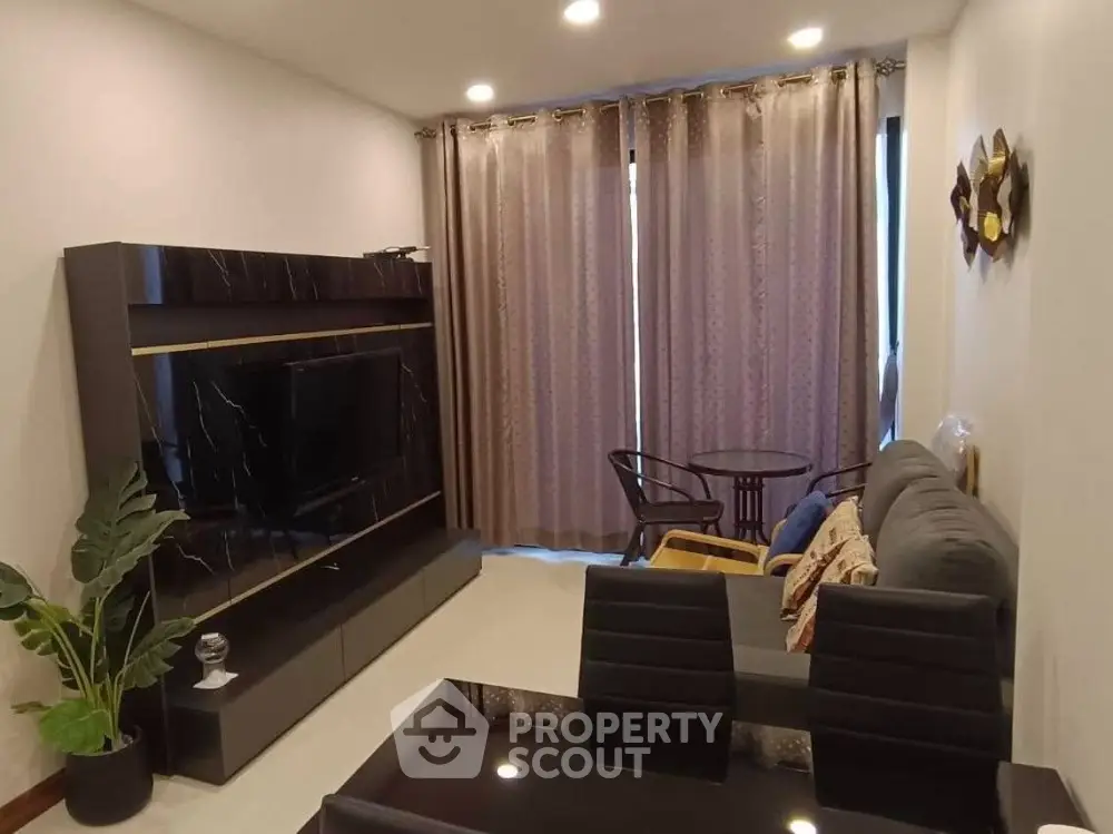 Modern living room with elegant decor and cozy seating area