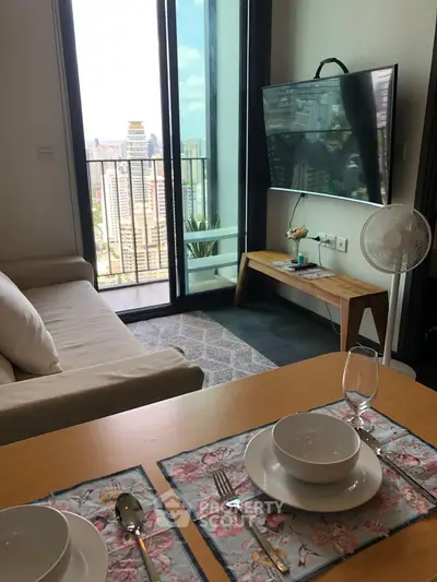 Modern living room with balcony view in high-rise apartment
