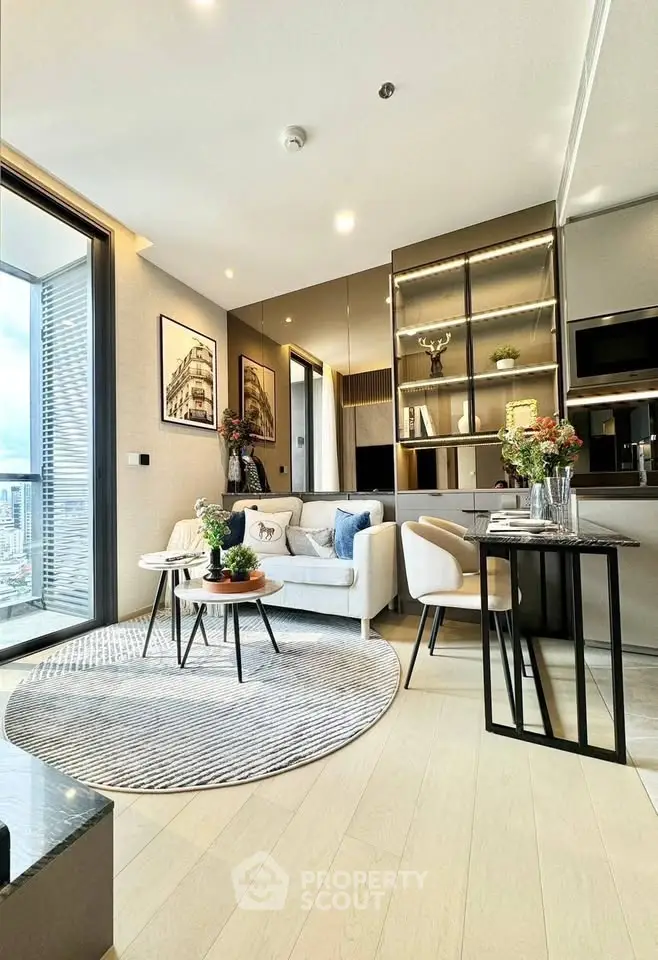 Modern living room with open layout and balcony view in luxury apartment