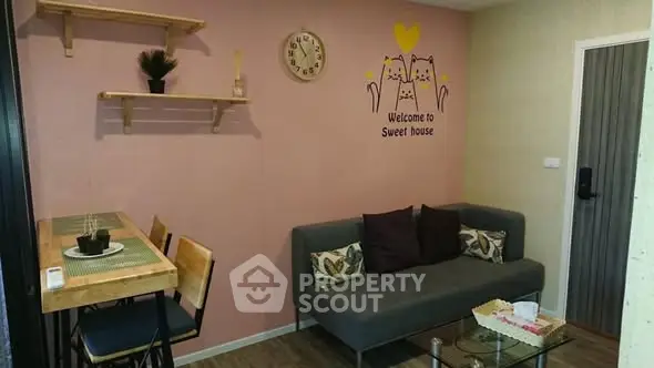 Charming living room with cozy sofa and dining area in modern apartment