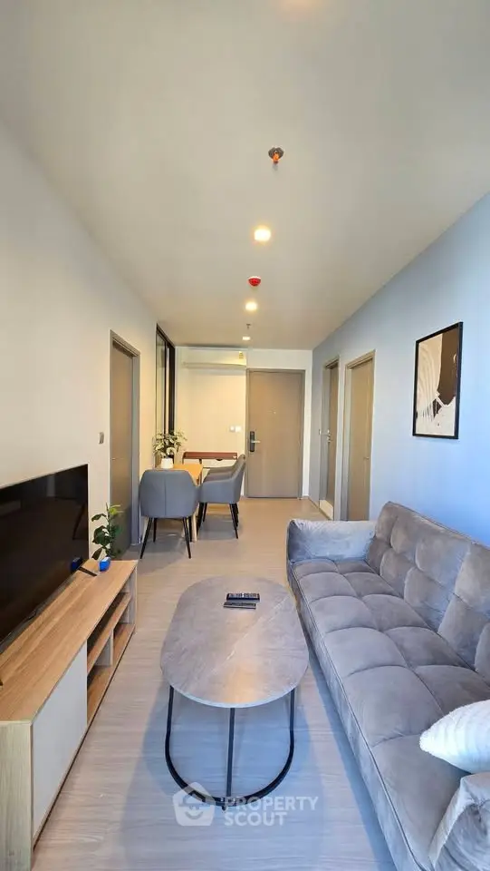 Modern living room with stylish furniture and open layout, perfect for relaxation and entertainment.