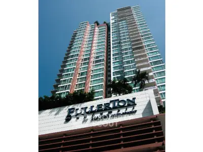 Stunning high-rise building with modern architecture and lush greenery, perfect for urban living.