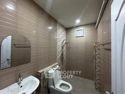 Modern bathroom with sleek fixtures and stylish tile design