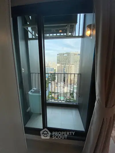 High-rise apartment balcony with stunning cityscape view