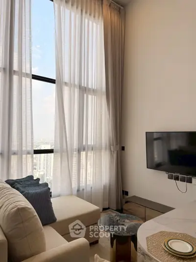 Luxurious high-rise living room with stunning city view and elegant decor