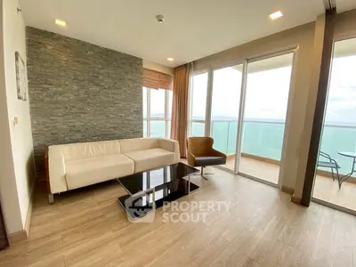 Luxurious living room with ocean view and modern furnishings