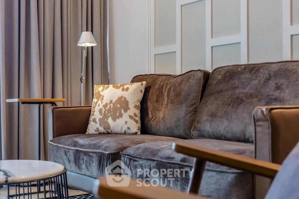 Elegant living room with plush brown sofa and stylish decor
