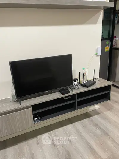 Modern living room with sleek TV stand and contemporary decor