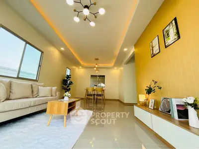 Modern living room with elegant decor and cozy lighting