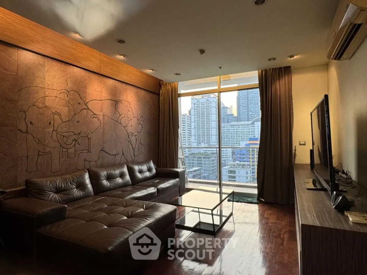 Luxurious living room with leather sofa and city view balcony in modern apartment