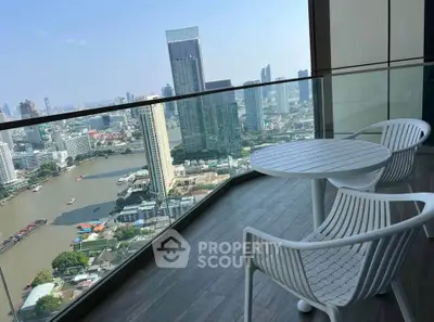 Stunning high-rise balcony with breathtaking city and river views, perfect for relaxation and entertainment.