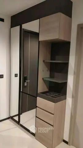 Modern interior storage unit with sleek design and ample shelving space.