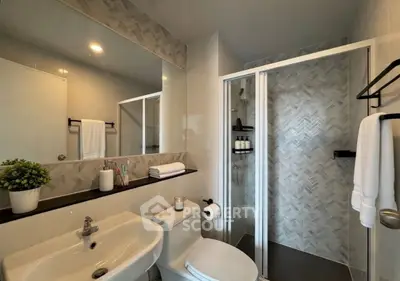 Modern bathroom with sleek shower and stylish decor