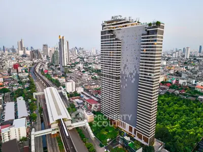 Stunning high-rise building with panoramic city views and lush greenery