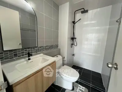 Modern bathroom with sleek fixtures and stylish tile design