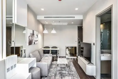 Modern living room with sleek furniture and stylish decor in a contemporary apartment.