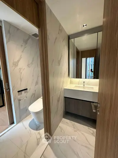 Modern bathroom with sleek design and elegant marble tiles