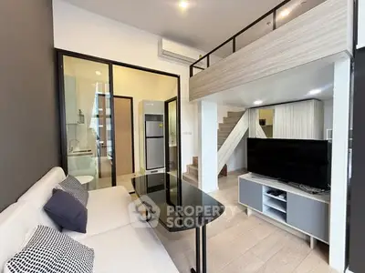 Modern loft-style living room with mezzanine and sleek interior design