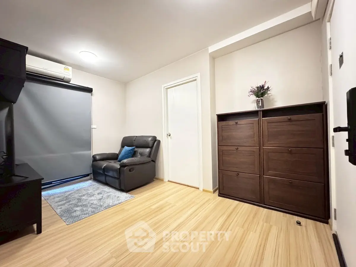 Cozy living room with modern decor and wooden flooring