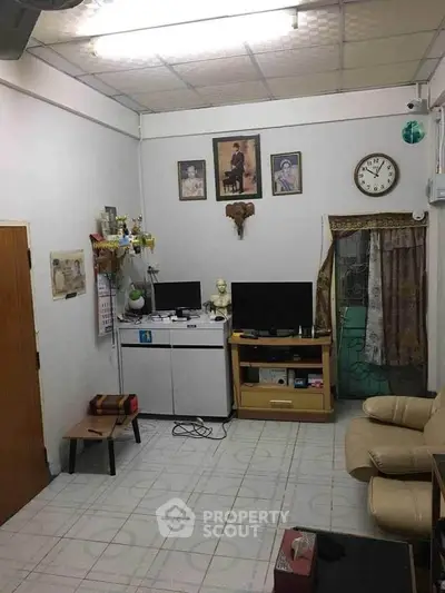 Cozy living room with eclectic decor and comfortable seating