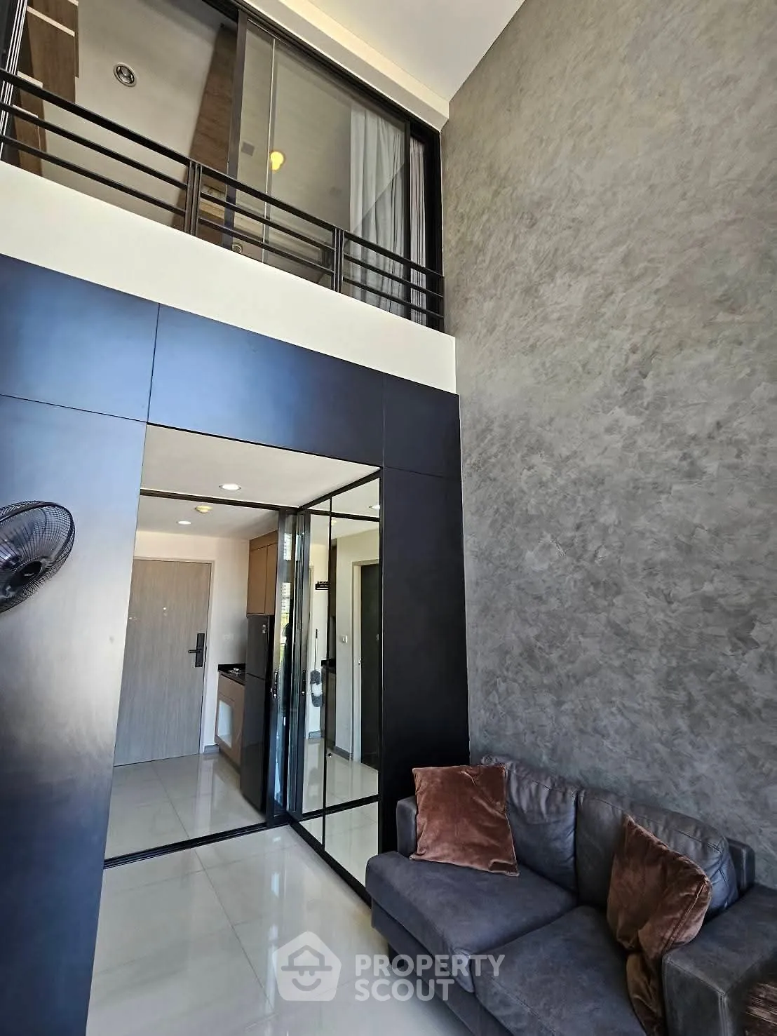 Modern loft apartment with high ceilings and sleek interior design