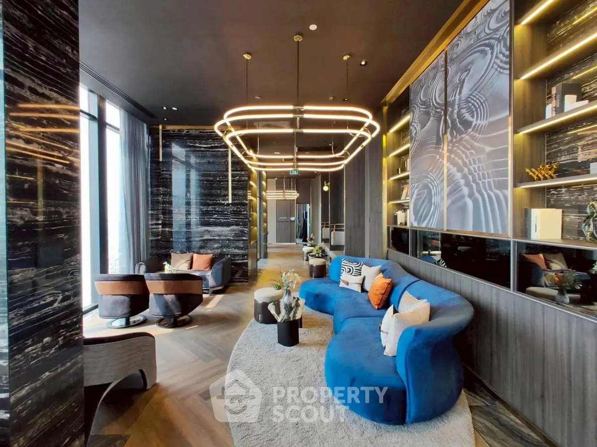 Luxurious modern living room with stylish furniture and elegant lighting in a high-end apartment.
