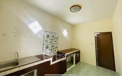 Spacious kitchen with modern design and ample natural light