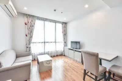 Bright and modern living room with natural light and stylish decor