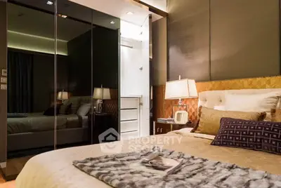 Luxurious bedroom with elegant decor and mirrored wardrobe