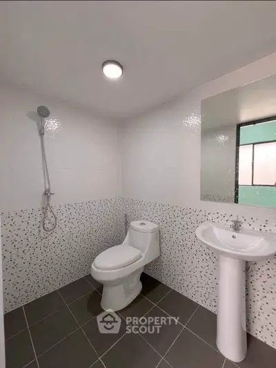 Modern bathroom with sleek fixtures and stylish tile design