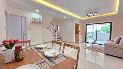 Spacious modern living room with elegant dining area and stylish decor