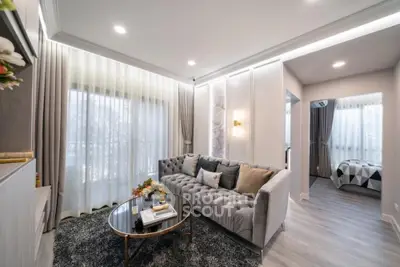 Luxurious modern living room with elegant decor and plush sofa in a stylish apartment