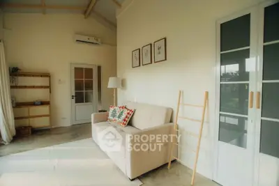 Cozy living room with modern decor and natural light