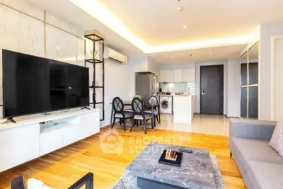 Spacious modern living room with open kitchen and stylish decor