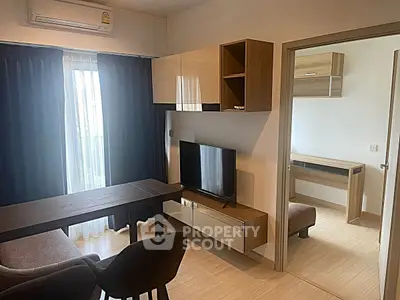Modern living room with sleek furniture and natural light