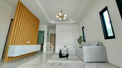 Modern living room with elegant marble flooring and stylish lighting