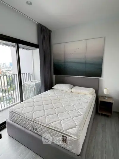 Modern bedroom with city view and stylish decor in high-rise apartment