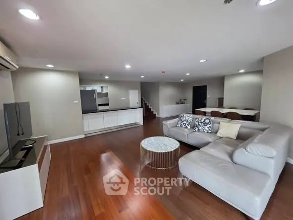 Spacious modern living room with elegant furniture and open layout