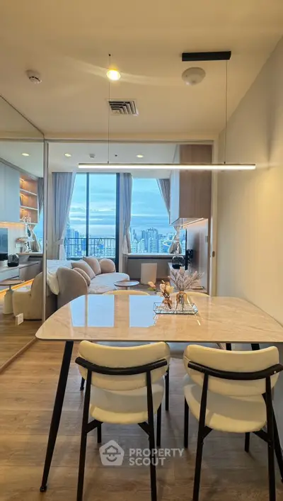 Modern dining area with city view in a stylish apartment